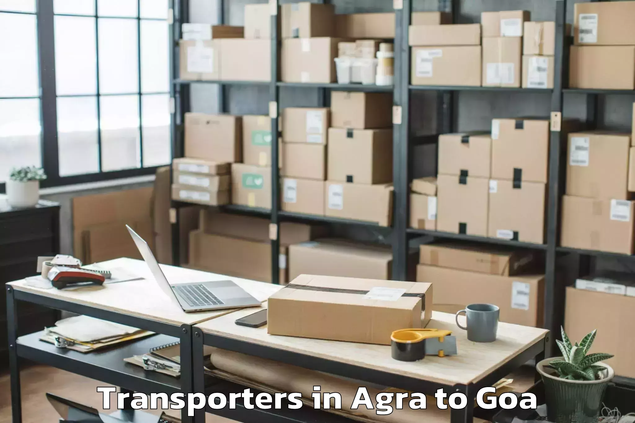 Top Agra to Mopa Transporters Available